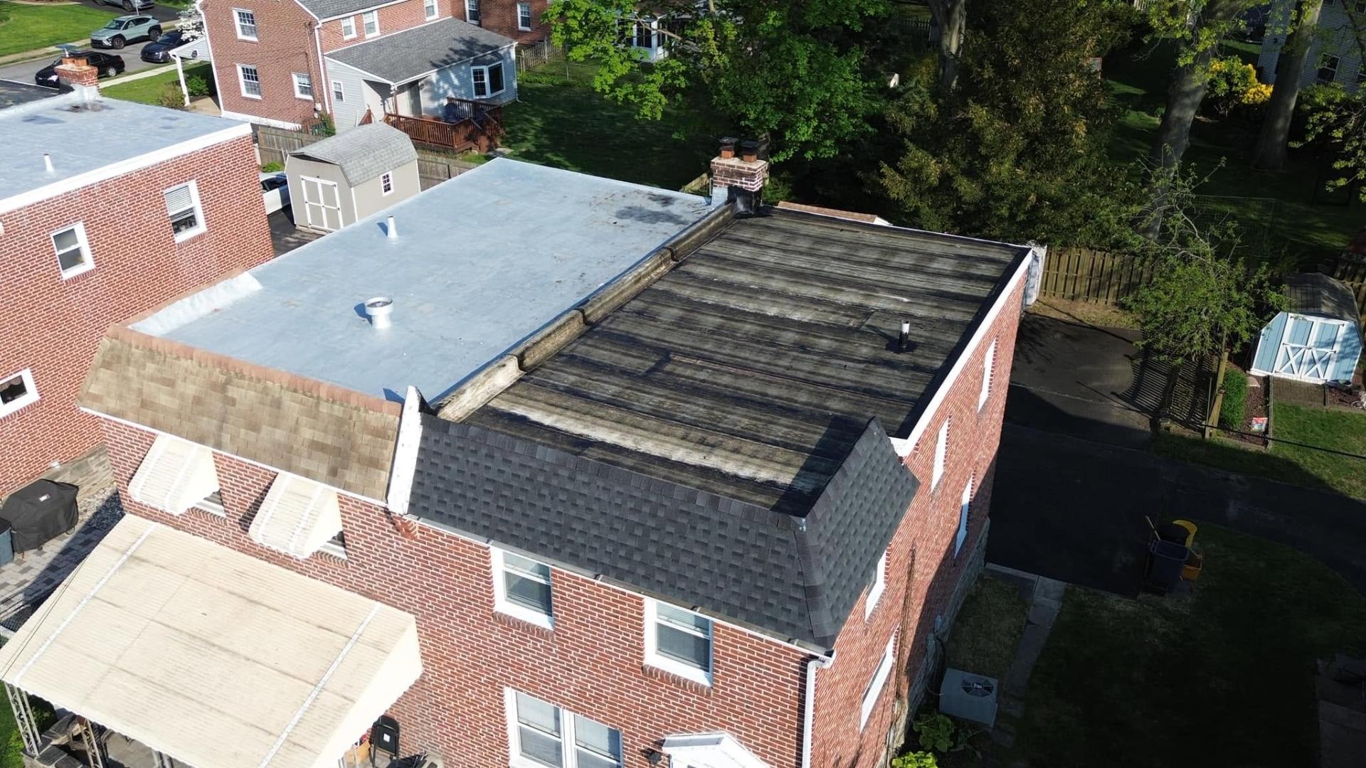 Aerial view of a Pickhaver Roofing project in progress on a Delaware County home